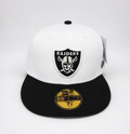 White and black cap with Raiders logo on a white background