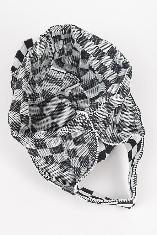 Black and white checkered swim cap on a white background