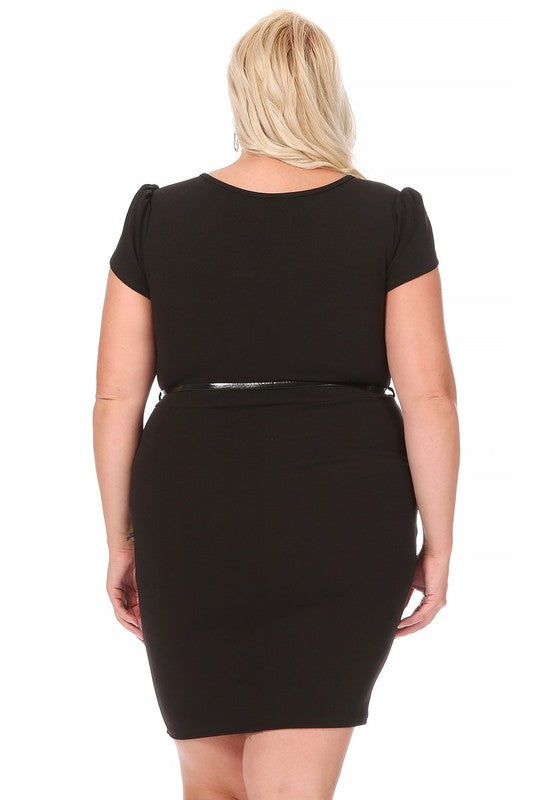 Person wearing a black dress with a belt on a white background