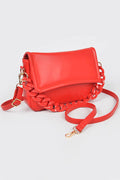 Bright red crossbody bag with a flap closure, chunky chain detail, and adjustable strap, displayed against a plain background.