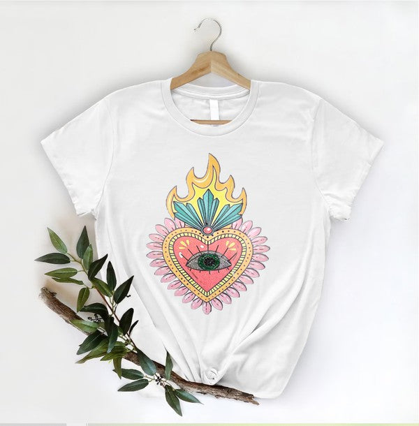 White t-shirt with a colorful heart design on a hanger