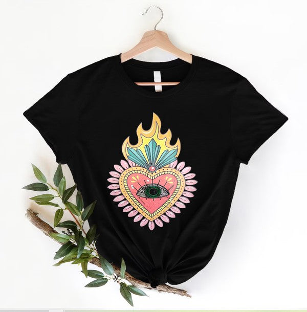 Black t-shirt with colorful heart design on a hanger