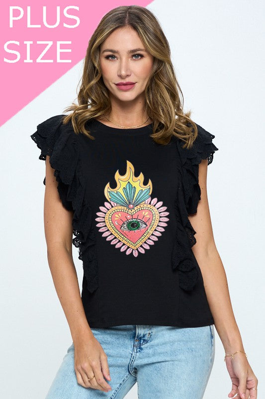 A plus-size woman wears a black t-shirt with layered ruffle sleeves and a colorful heart graphic featuring a flame and eye design at the center. She pairs it with light-wash jeans, standing against a neutral background with a “PLUS SIZE” label displayed in the top corner.