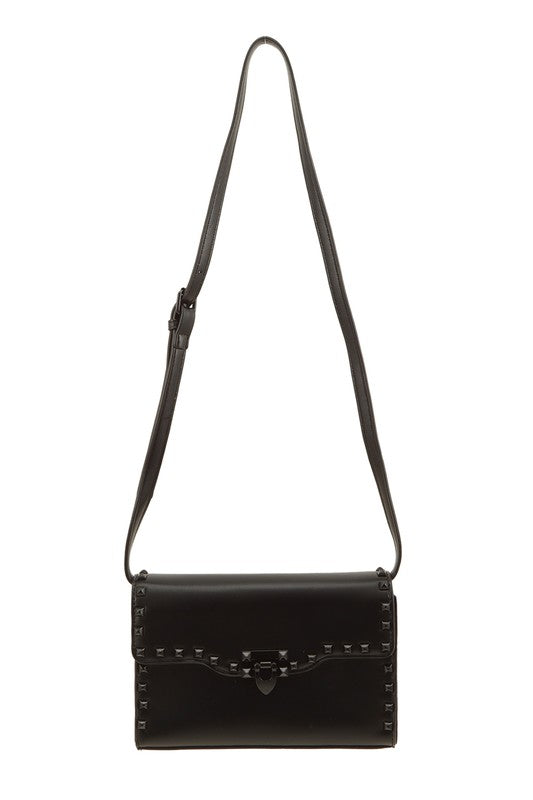Black leather handbag with studded details on a white background