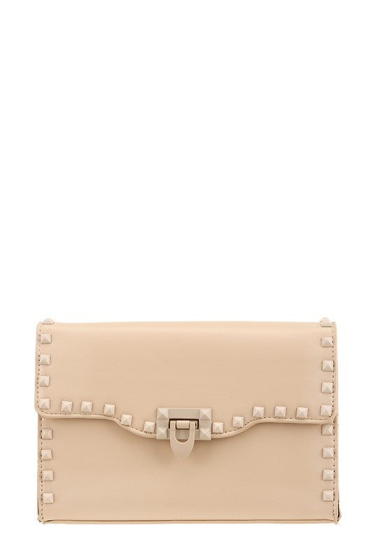 Beige clutch bag with studded details on a white background