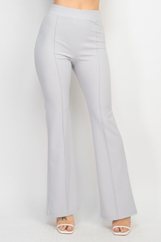 Light gray flared pants on a white background