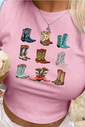 Pink sweatshirt with colorful cowboy boot graphics worn by a person.