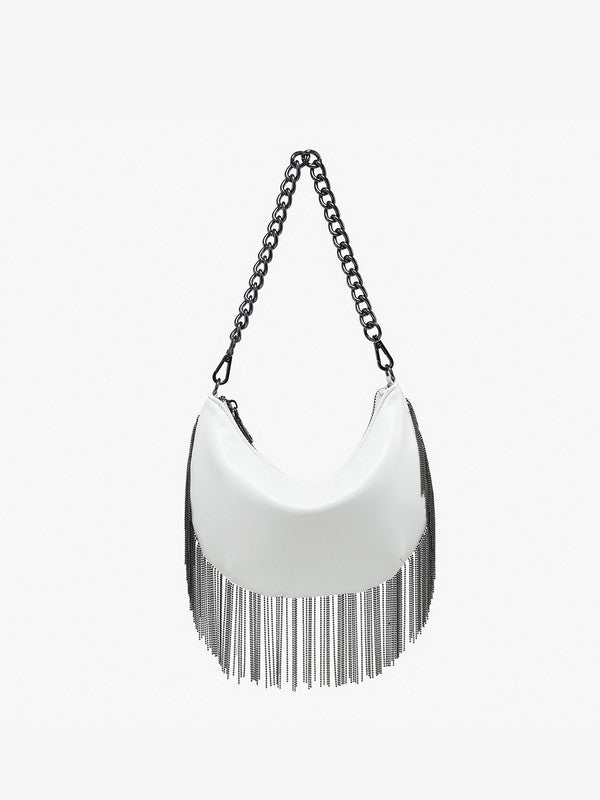 White handbag with fringe details and a chain strap on a white background