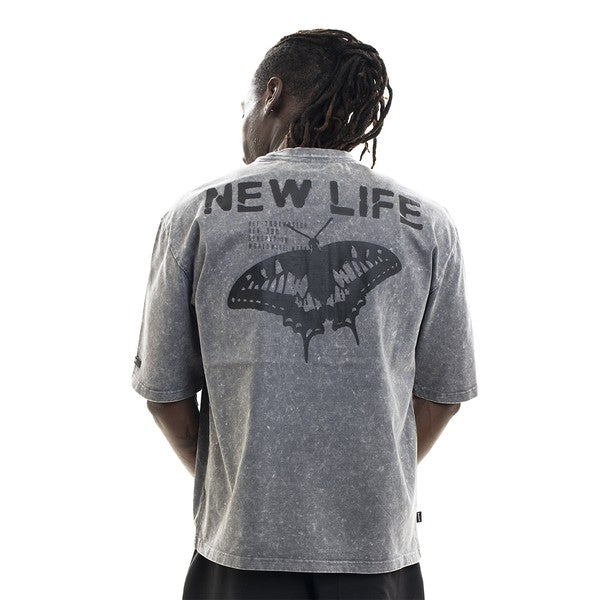 Person wearing a gray t-shirt with 'NEW LIFE' text and butterfly design on the back, on a white background.