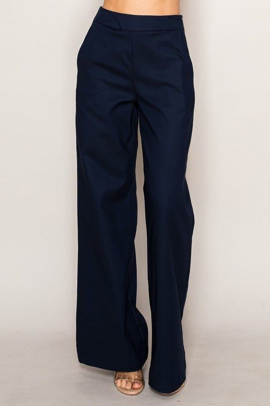 Navy blue wide-leg pants on a plain background