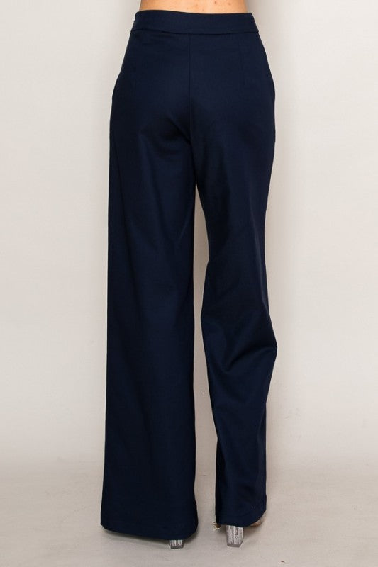 Navy blue wide-leg pants on a white background