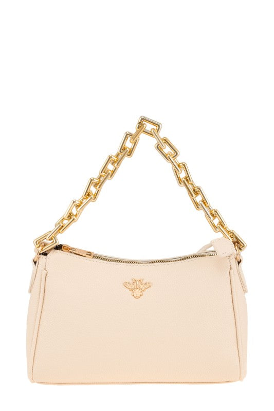 Beige handbag with gold chain handle on a white background