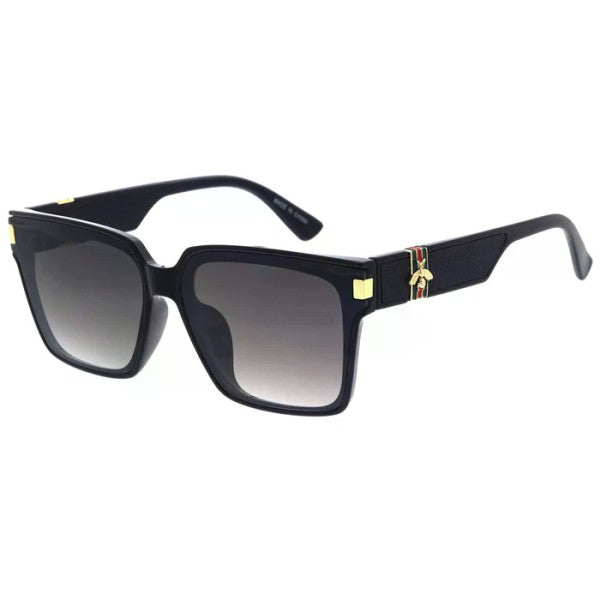 Black sunglasses with gold accents on a white background