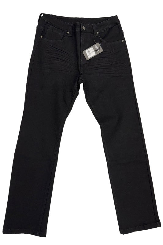 Black jeans with a tag on a white background
