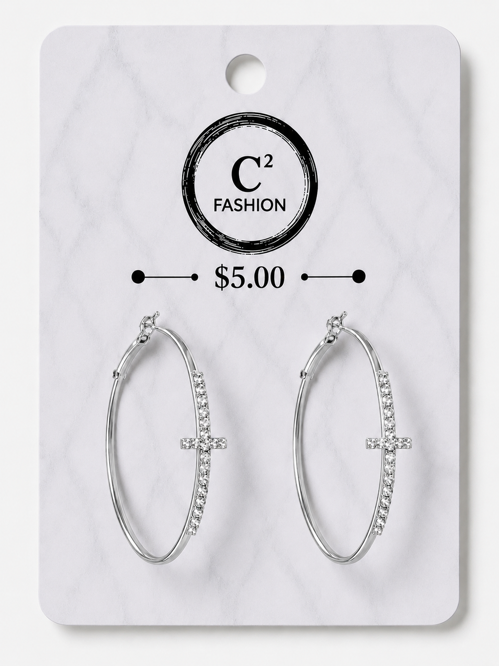 A pair of silver-tone hoop earrings with small clear rhinestone accents on the right side, displayed on a white marble-patterned retail card. The card shows the brand name 'C² FASHION' and a price of '$5.