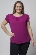 Magenta tulip blouse with black pants. 