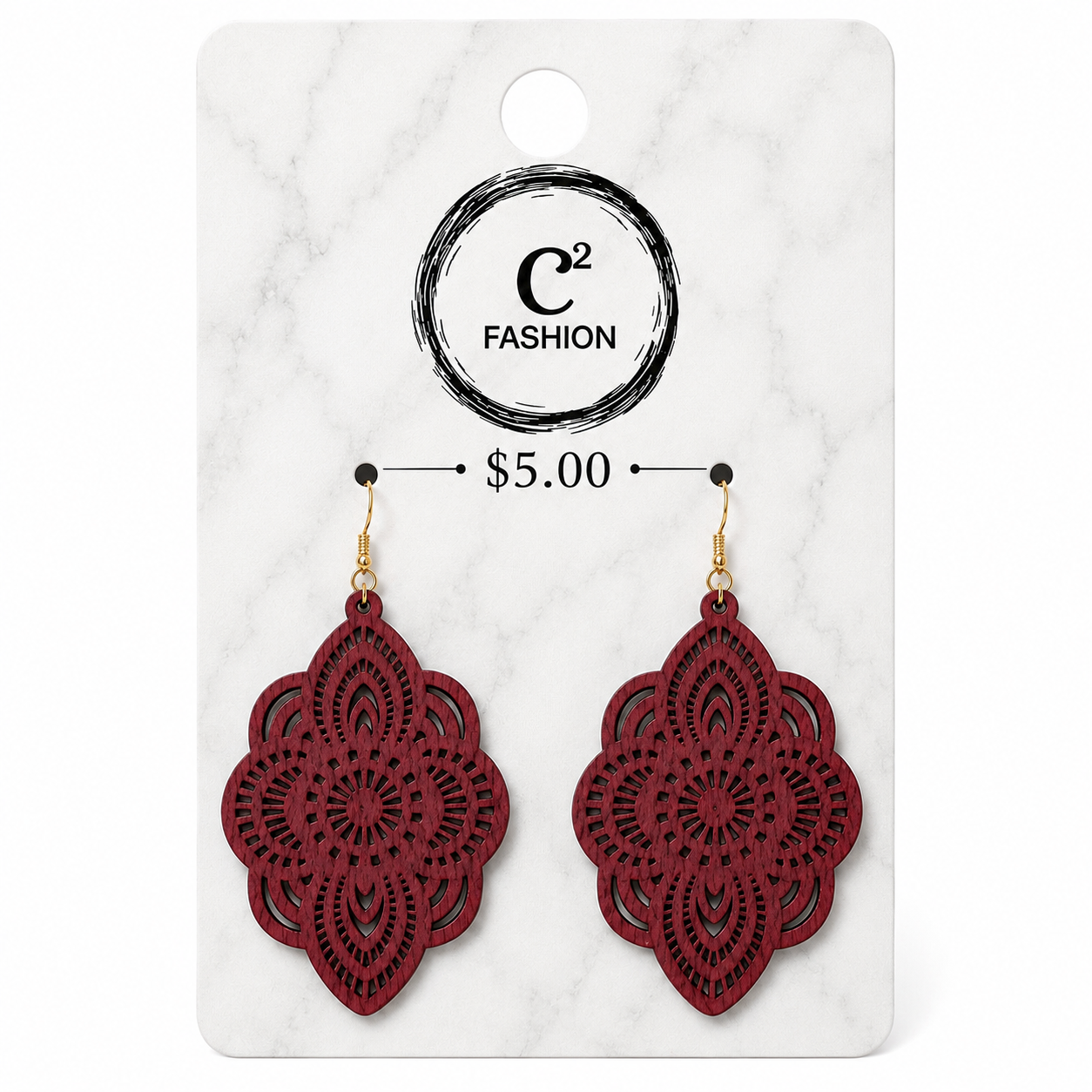A pair of red laser-cut dangle earrings with gold hooks, displayed on a white marble-patterned retail card featuring the brand name 'C2 FASHION' and a price of '$5.00'.