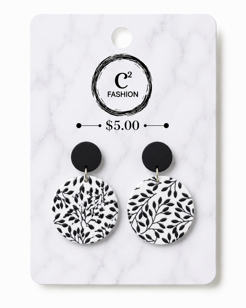 Black and white clay hanging earrings with black details 