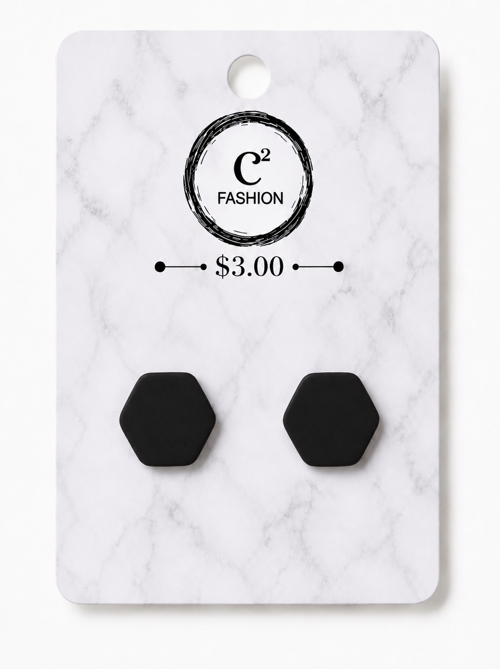 A pair of matte black hexagonal stud earrings displayed on a white marble-patterned retail card with the brand name C2 FASHION and a $3.00 price printed on it.