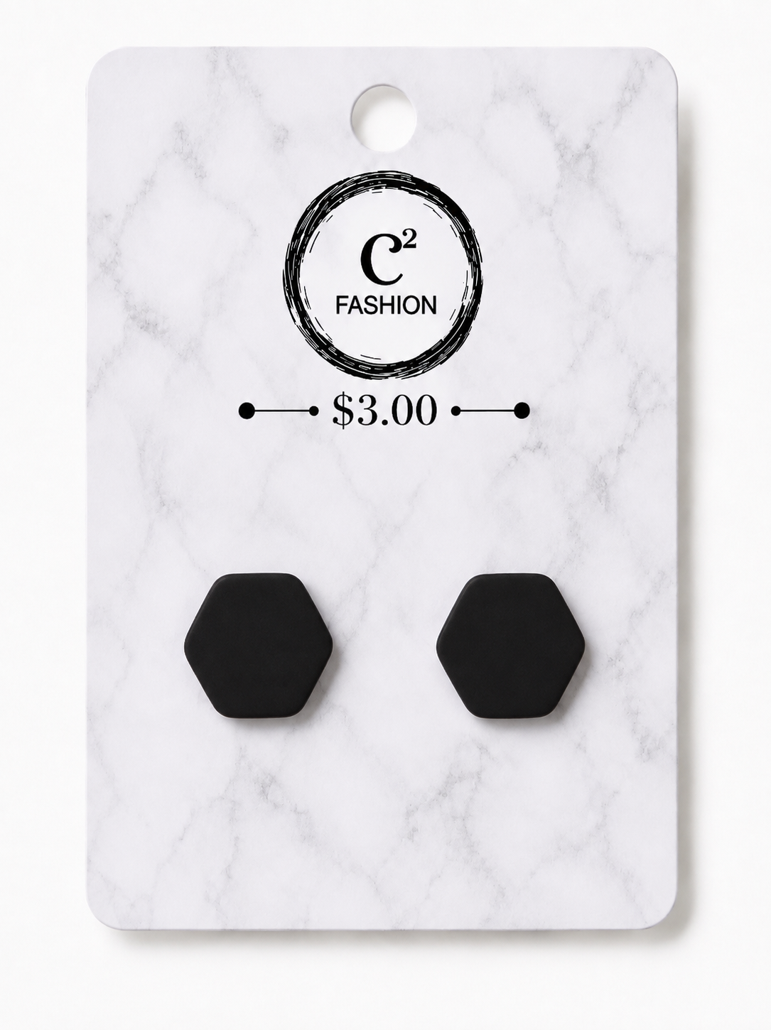 A pair of matte black hexagonal stud earrings displayed on a white marble-patterned retail card with the brand name C2 FASHION and a $3.00 price printed on it.