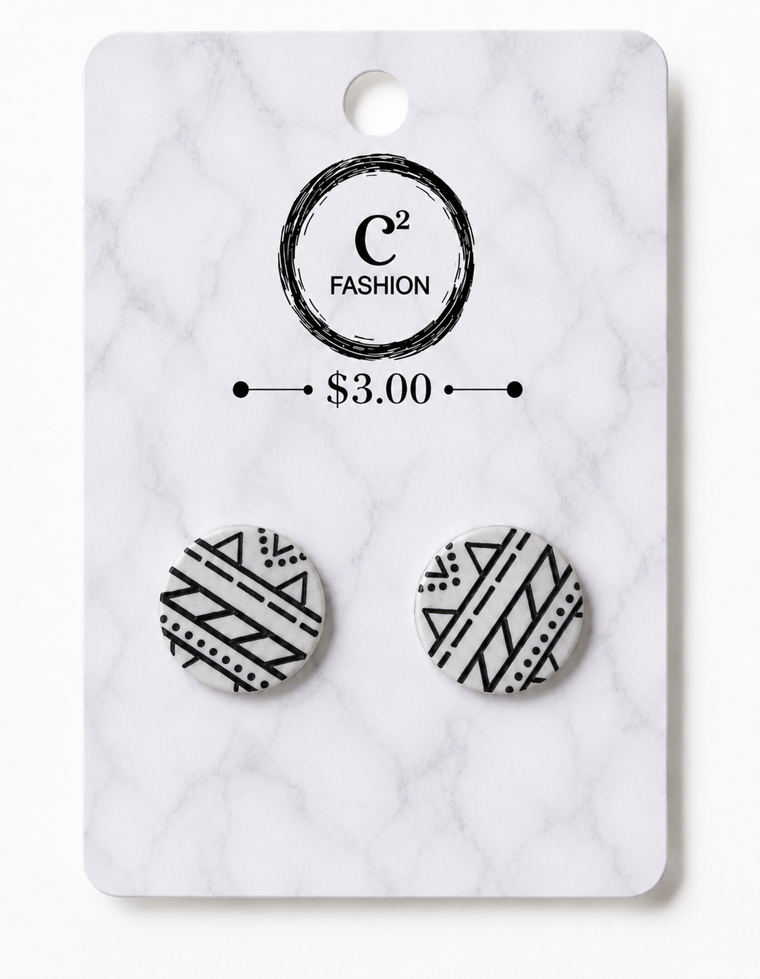 A pair of round stud earrings with black geometric tribal patterns on a white background, mounted on a white marble-patterned display card with the brand name C2 FASHION and a $3.00 price printed on it.