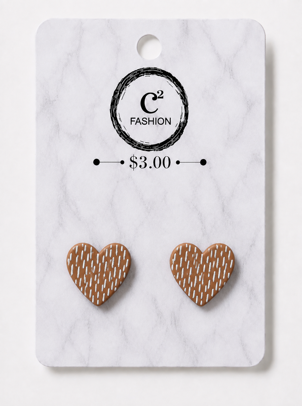A pair of heart-shaped stud earrings with a brown and beige basketweave pattern, displayed on a white marble-patterned retail card with the brand logo 'C2 FASHION' and a price of '$3.00'.