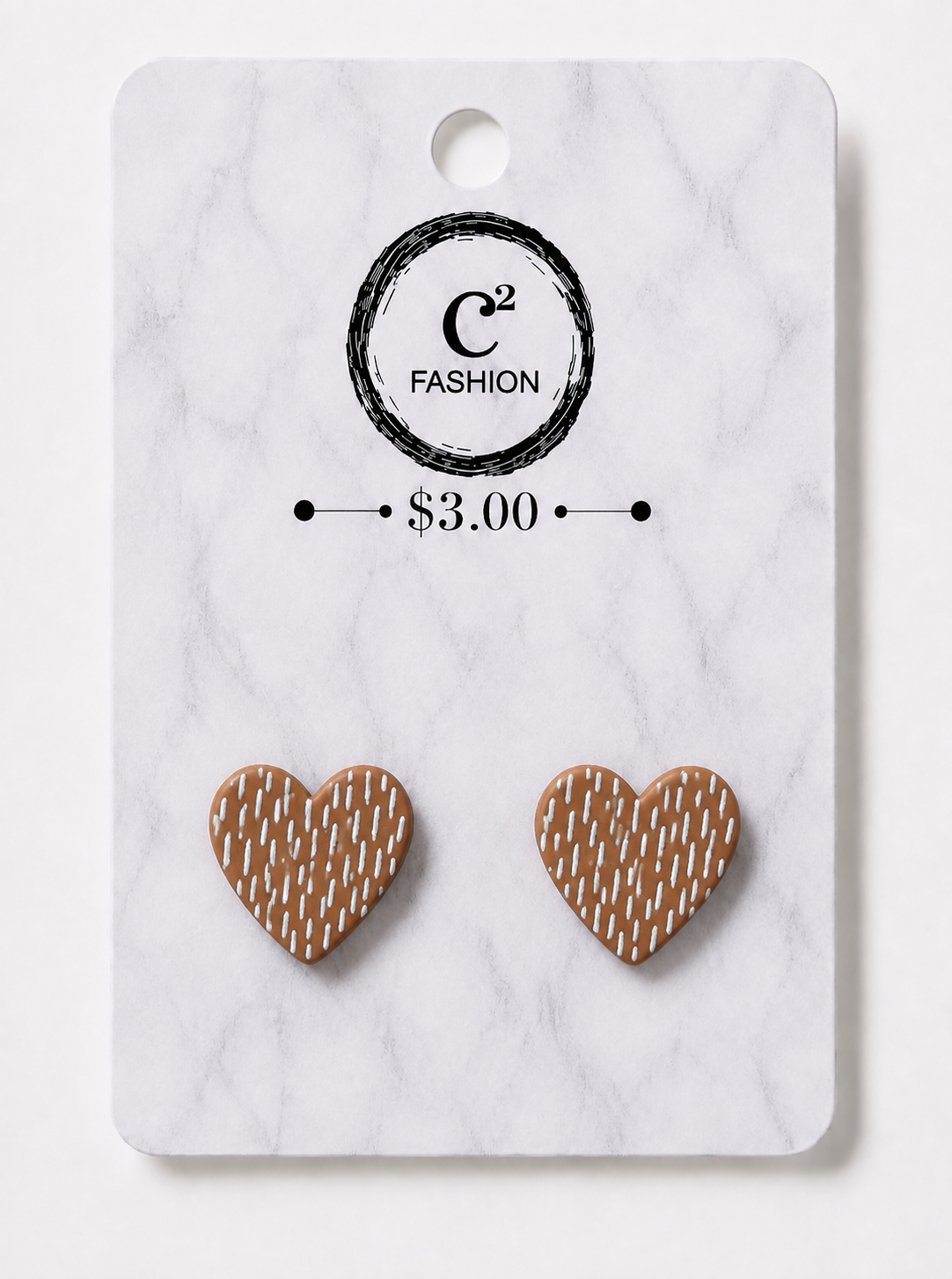 A pair of heart-shaped stud earrings with a brown and beige basketweave pattern, displayed on a white marble-patterned retail card with the brand logo 'C2 FASHION' and a price of '$3.00'.