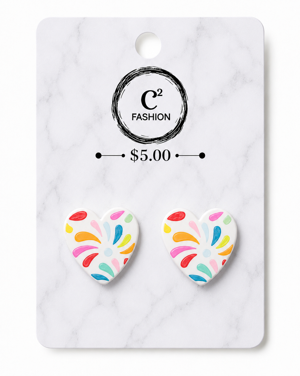 A pair of white heart-shaped stud earrings with colorful paint splatter patterns, displayed on a white marble backing card featuring the brand name C2 FASHION and a price of $5.00.