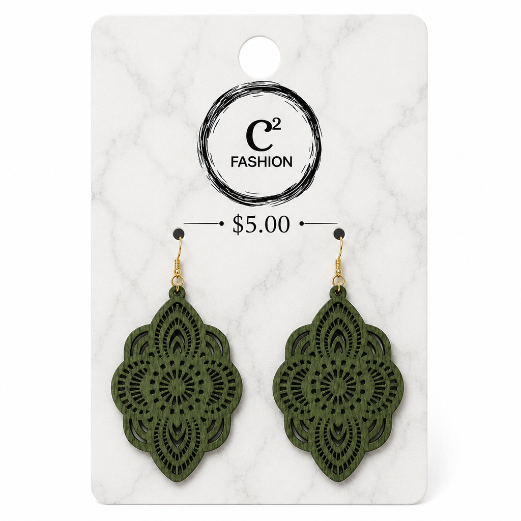 A pair of olive green laser-cut dangle earrings with gold hooks, displayed on a white marble-patterned card with the brand logo 'C2 FASHION' and a price of '$5.00' printed on it.