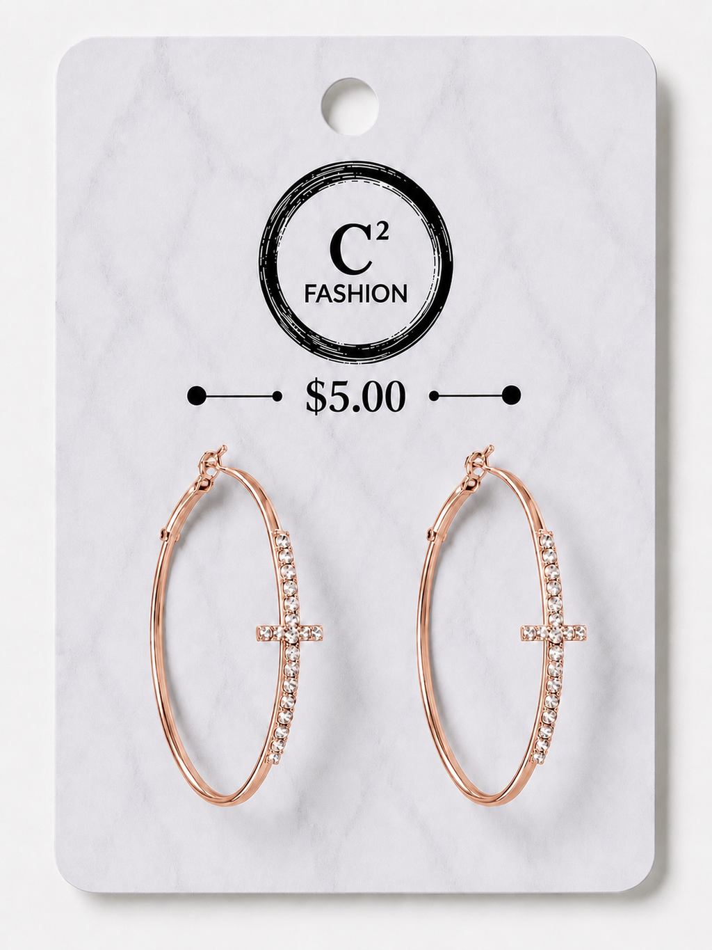 Rose gold hoop earrings with small clear crystal accents on the right side and a central cross charm, displayed on a white marble-patterned retail card labeled C² FASHION with a $5.00 price.