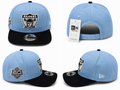 Powder blue and black Raiders snapback with shield logo and commitment-to-excellence side patch.