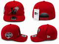 Red Dodgers snapback featuring raised black LA logo with embroidered roses and commemorative side patch.