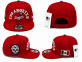 Bold red Dodgers snapback with embroidered Dodgers script, Day of the Dead side patch, and Mexico flag accent.