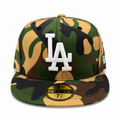 Camouflage baseball cap with LA logo on a white background