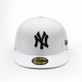 White New Era 59FIFTY fitted cap with black “NY” logo on the front, flat brim, size 7 1/4, displayed on a clean white background.