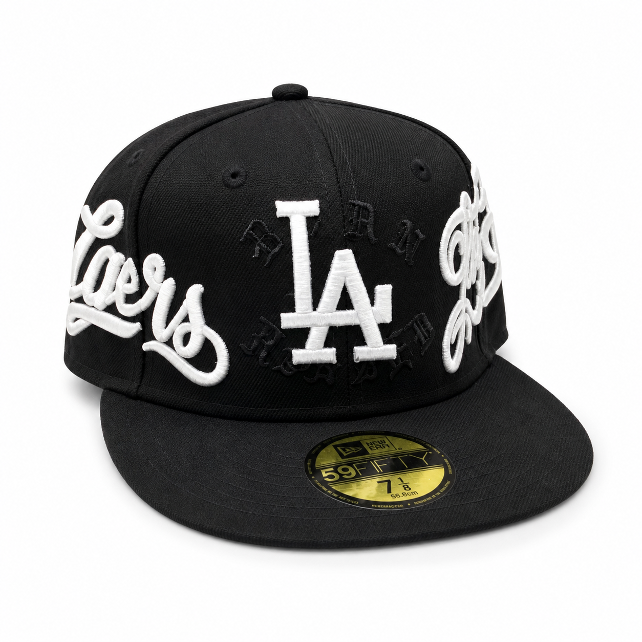 Black New Era 59FIFTY fitted cap with raised white “LA” logo and “Los Angeles” script embroidery around the crown, flat brim, size 7 1/8, shown on a clean white background.