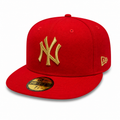 Red New Era 59FIFTY fitted cap with raised gold “NY” logo, flat brim, size 7 1/8, displayed on a clean white background.