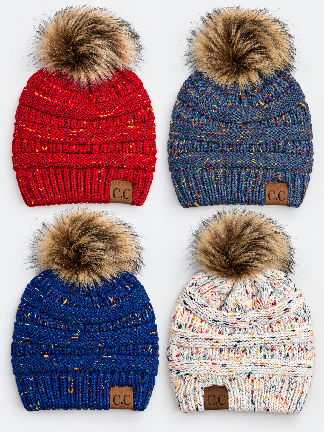Four knit pom-pom beanies arranged in a 2x2 grid on a white background. The top-left is red with subtle orange/yellow flecks and a brown faux-fur pom-pom.