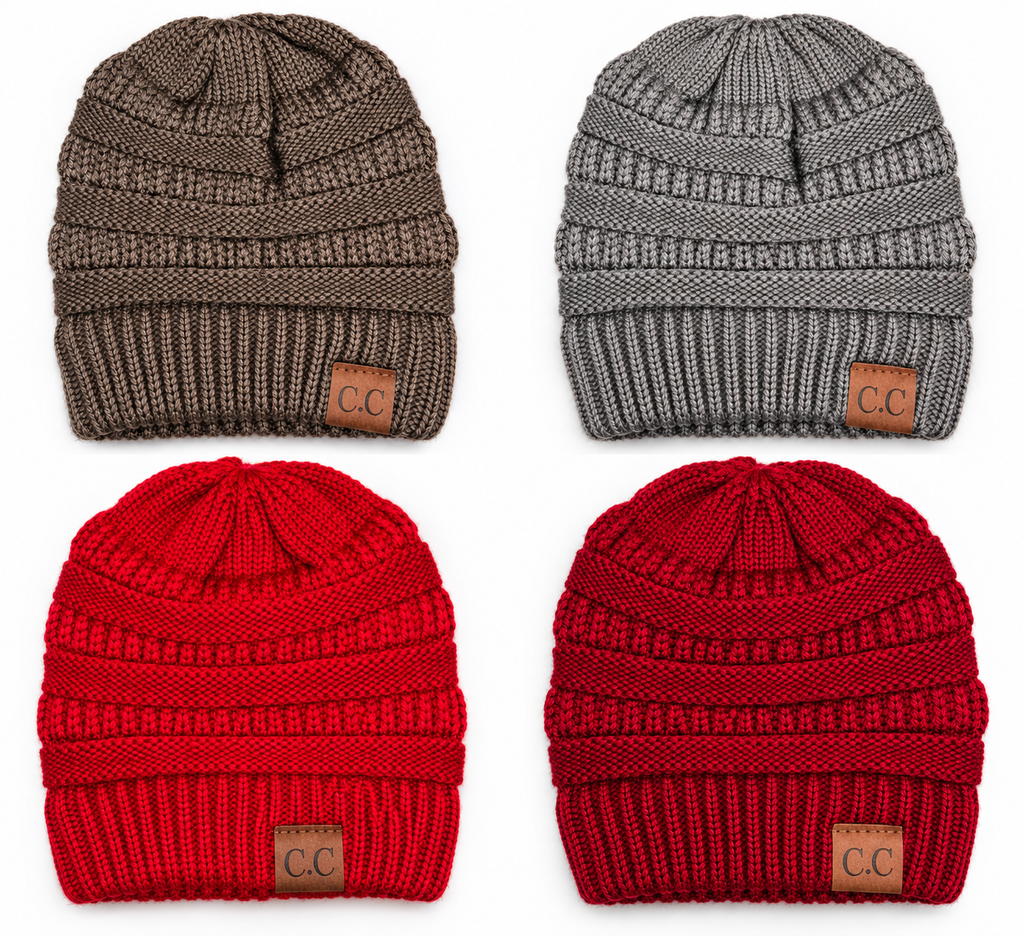 Four ribbed knit beanie hats arranged in a 2x2 grid on a white background, showing two brown and two red color options. Each beanie has a small tan leather patch on the lower cuff with the letters 'CC' embroidered on it.