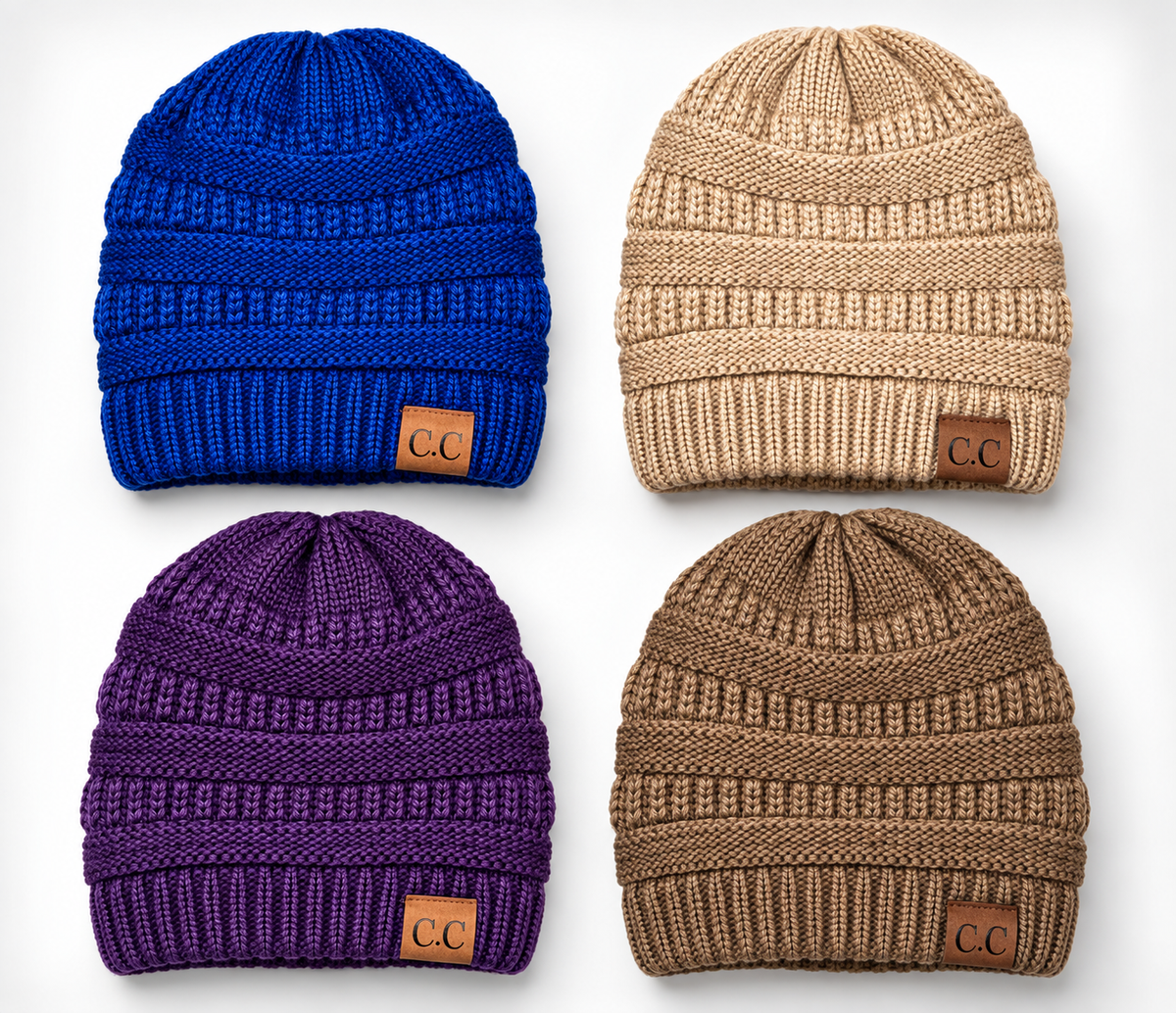 Four ribbed knit beanie hats arranged in a 2x2 grid on a light gray background, shown in blue, tan, purple, and brown. Each beanie has a small brown leather patch on the front cuff with the letters 'CC' in white.