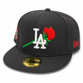 Black baseball cap with LA logo and red rose on a white background