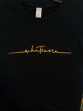 Black t-shirt with gold 'whatevs' text on a plain background