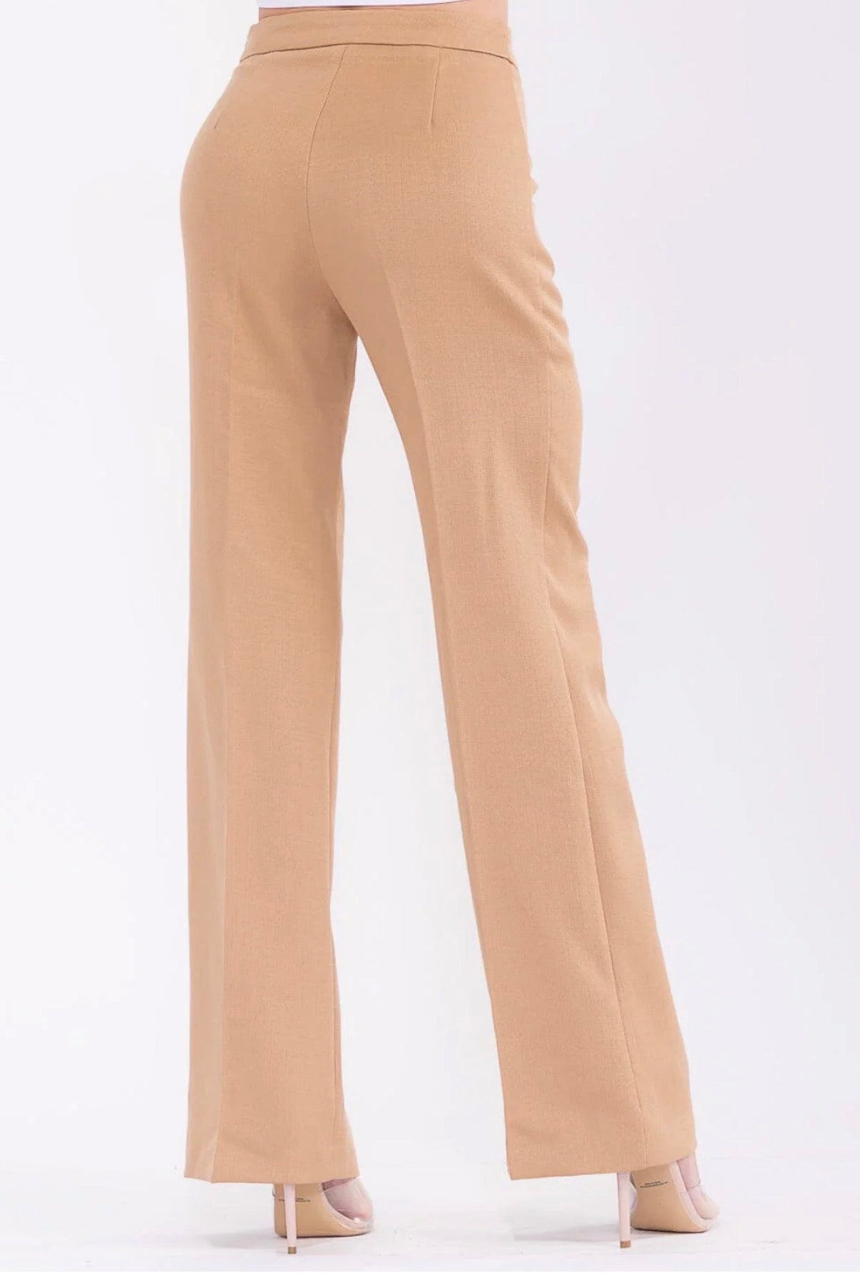 Tan high-waisted pants on a white background