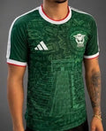 Man wearing a Mexico green jersey.