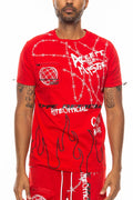 Person wearing a red graphic t-shirt with various designs and text.
